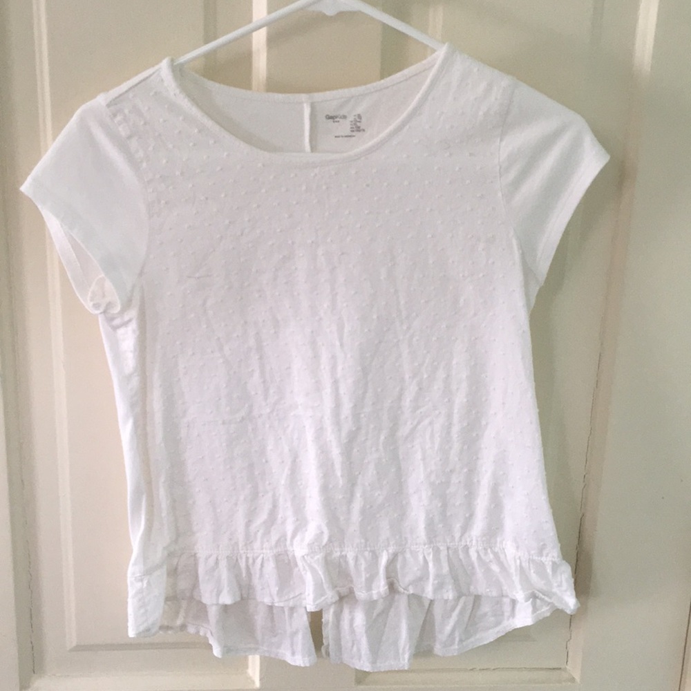 white swiss dot ruffle hem top